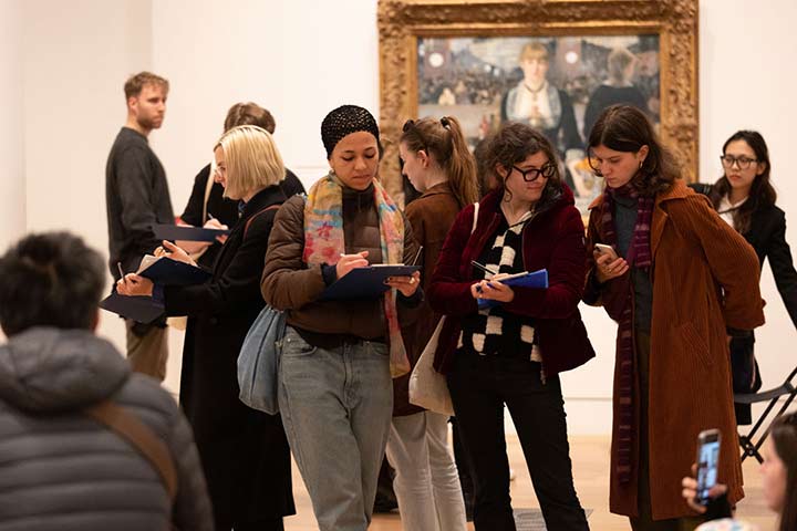 A group of visitors in The Courtauld Gallery during a Morgan Stanley Lates