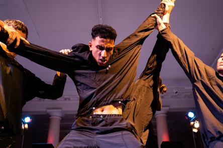 A photo of a performance at AGM 2021, choreographed by Saul Nash.