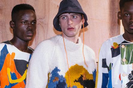 A photo of 3 men wearing patterned clothes at a fashion show, designed by Bethany Williams