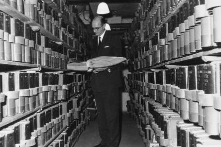Births, Marriages and Deaths at Somerset House image A black and white photo of the Registrar General in the vaults of Somerset House.