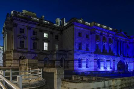 Somerset House South Wing lit up blue at night