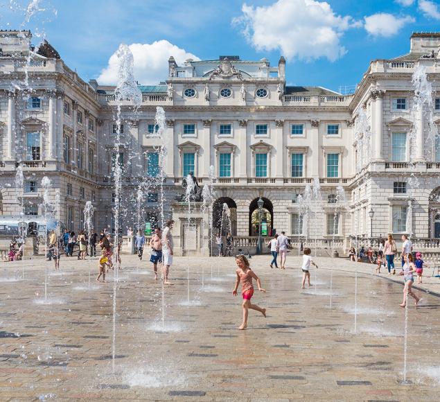 People playing in the fountains, The Edmond J. Safra Fountain Court, Somerset House