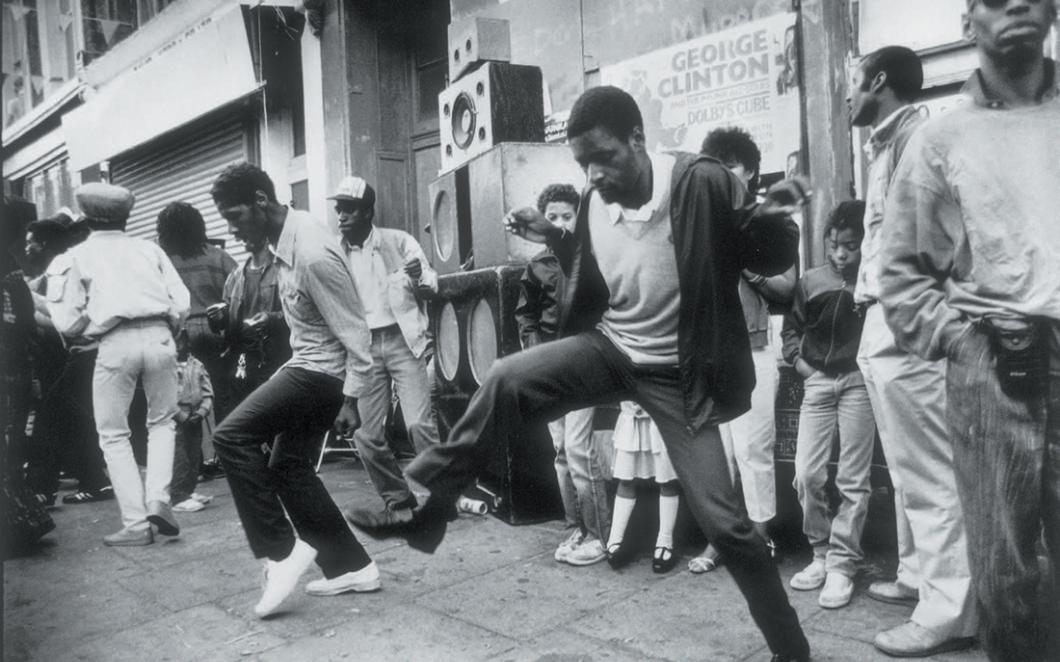 People dancing at a sound system at Nottting Hill Carnival in 1980