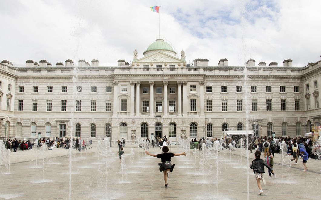 Children playing in the fountains in The Edmond J. Safra Fountain Court, Somerset House