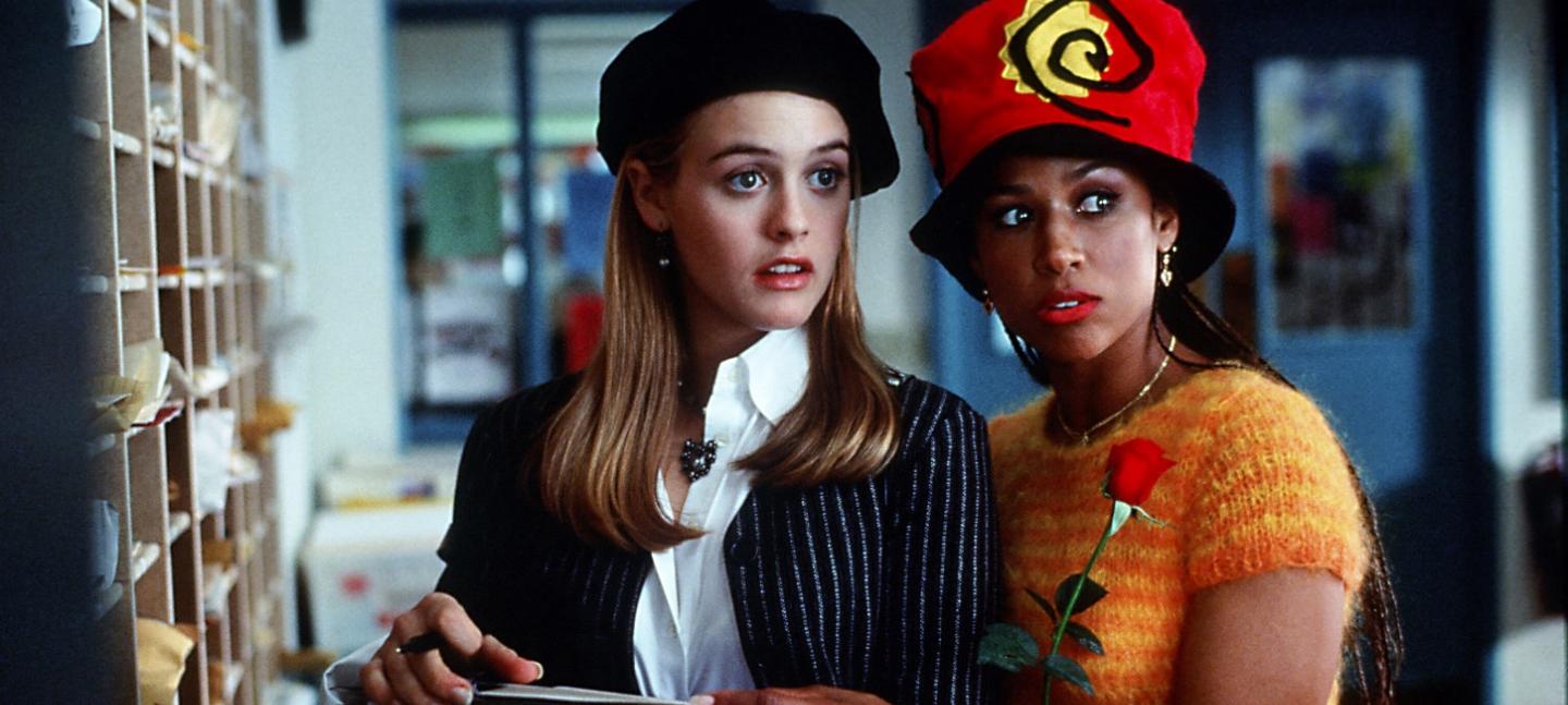 Film still of two high school students at lockers