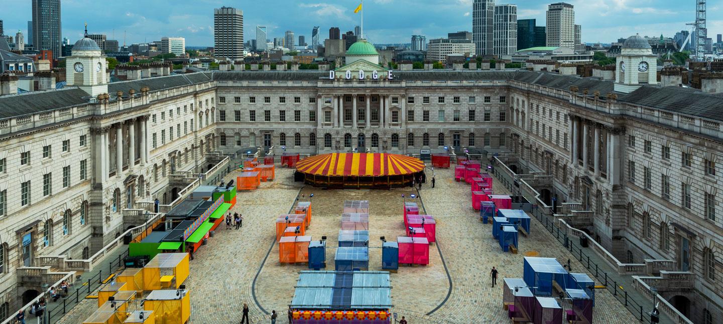 Dodge at Somerset House, showing bumper cars and passengers in the courtyard