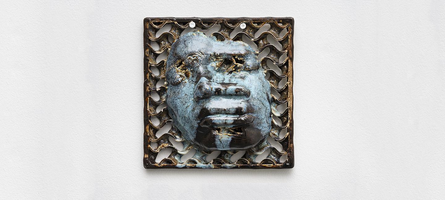 Ceramic sculpture of a face