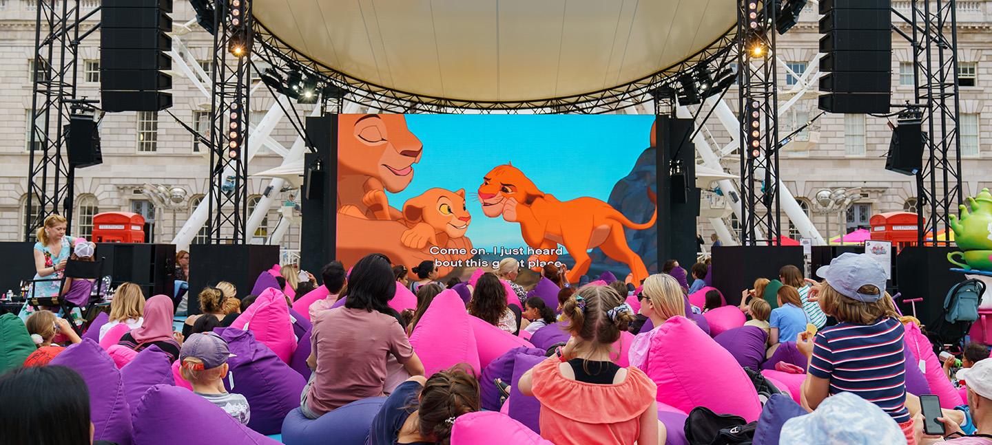 This Bright Land, children watching The Lion King on a big screen