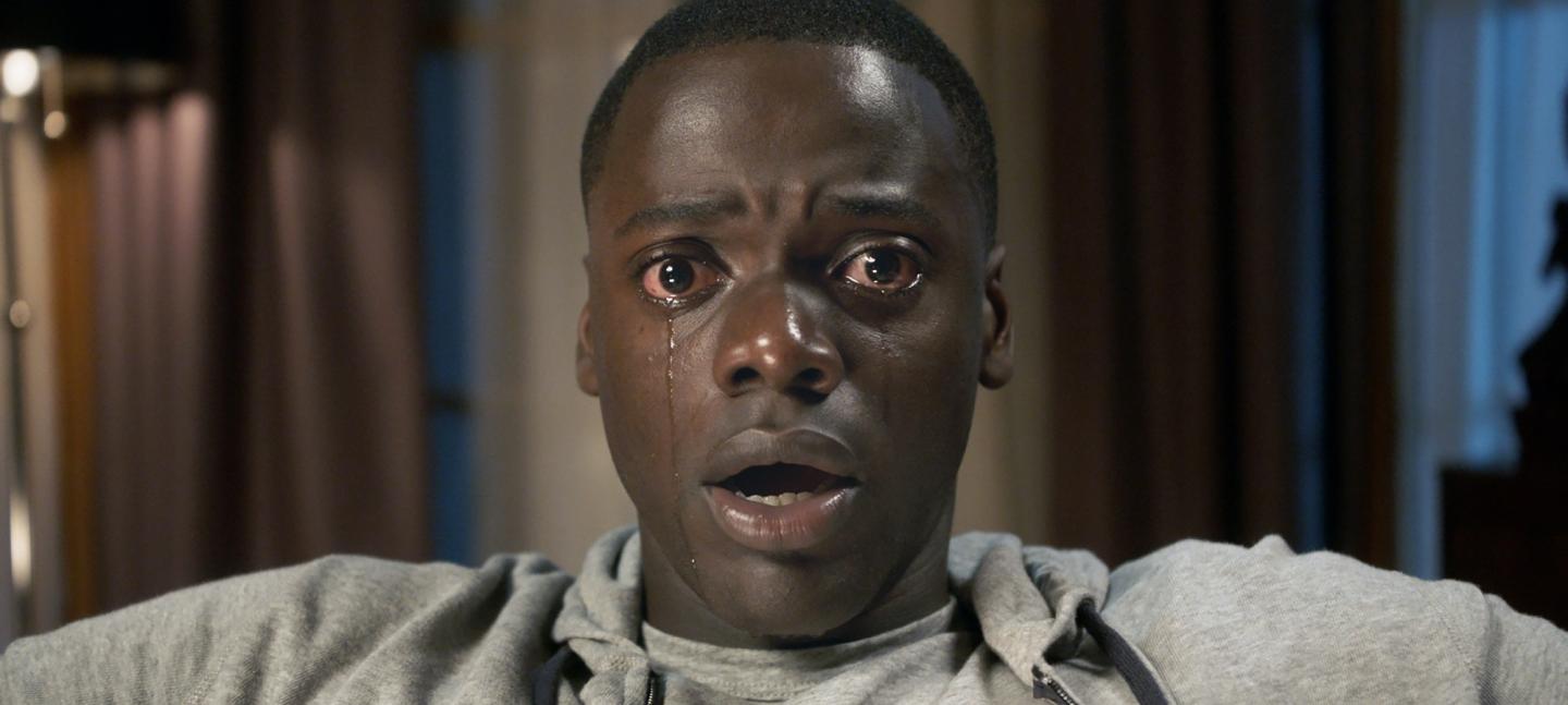 Film still of close-up of man crying