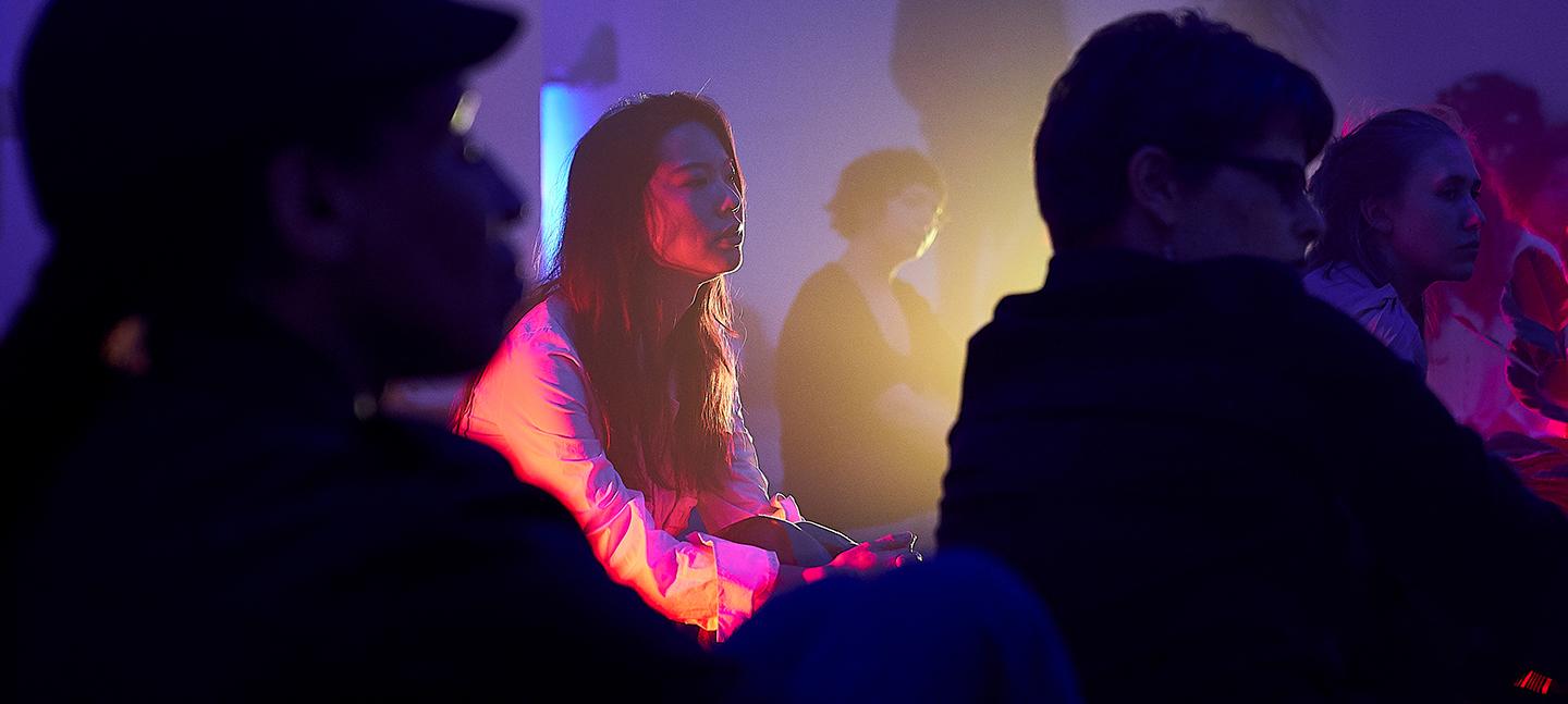 A photo of audience members at an event at Somerset House. The audience looks thoughtful and engaged.