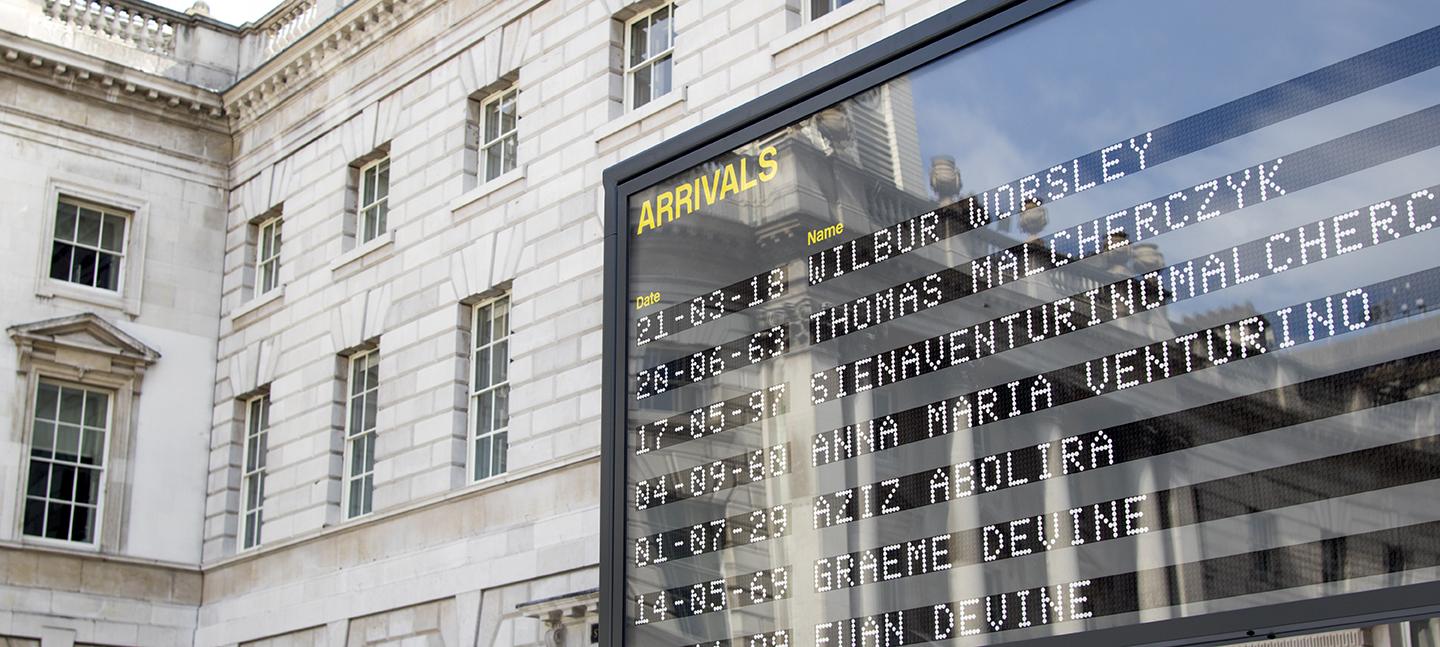An install photo of the Arrivals board in Somerset House's courtyard