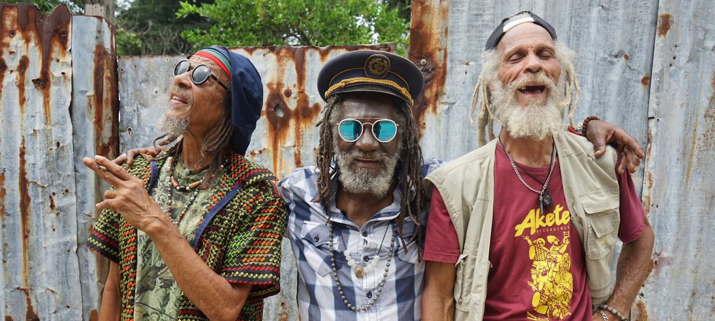 Film still of reggae legends Winston McAnuff, Kiddus I and Cedric Myton looking at the camera. Image courtesy of Picturehouse