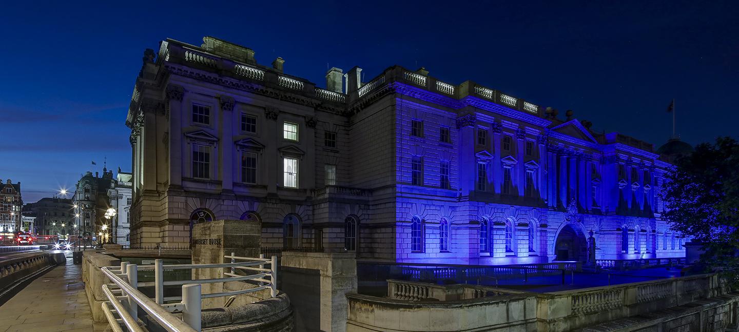 Somerset House South Wing lit up blue at night