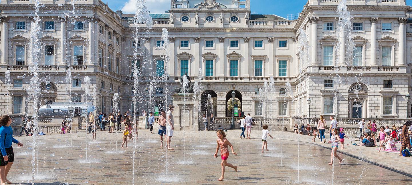 People playing in the fountains, The Edmond J. Safra Fountain Court, Somerset House