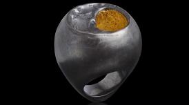 A chunky silver and gold ring, designed by Emefa Cole