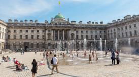 People enjoying The Edmond J. Safra Fountain Court, Somerset House