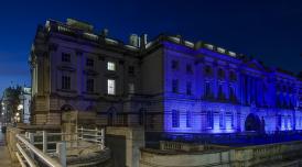 Somerset House South Wing lit up blue at night